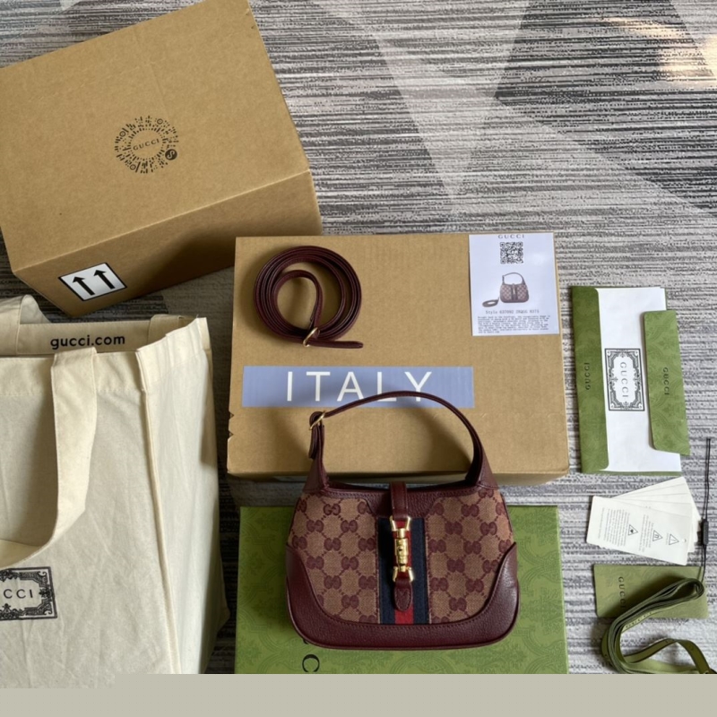 G*u*i top handle bags